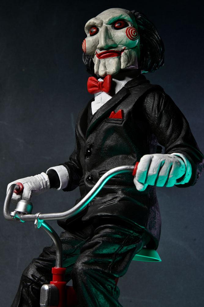 NECA Saw Billy mit Dreirad Actionfigur