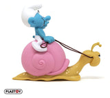 Die Schlümpfe: Spardose Smurf on a Snail's Back 19 cm